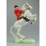 Beswick rearing huntsman on painted white horse 868