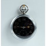 Military pocket watch with black dial marked to the back with broad arrow G.S.T.