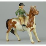 Beswick girl on skewbald pony 1499