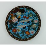 A Chinese Cloisonne charger decorated wi