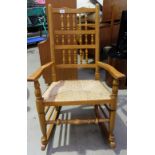 Rush Seated Reproduction rocking chair in light oak