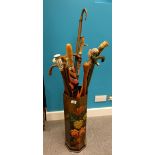 A good collection of Walking sticks and staff in ornate painting stick stand (15)