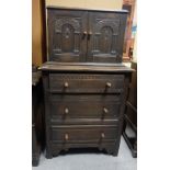 Small dark oak chest of drawers with cupboard top