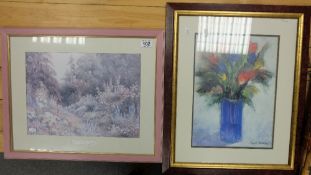 A pair of framed prints with floral design (2)