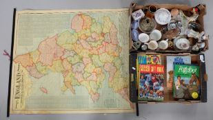 A old school map of the UK on canvas together with collection of 1980s annuals and a collection of