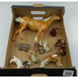 A collection of small animal figures to