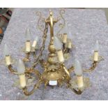 Smaller twentieth century ornate eight branch chandelier decorated with dancing cherubs