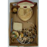 A collection of costume jewellery to include pearls, broaches, bracelets,