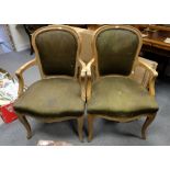 Two upholstered French Carved oak arm chairs (2)