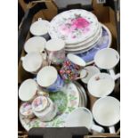 A mixed collection of decorative items to include wall plates,