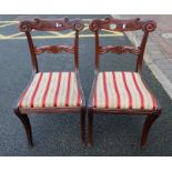 Two decorative dining chairs