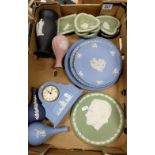 A good collection of multicoloured Wedgwood items to include jasper blue clocks and plates,