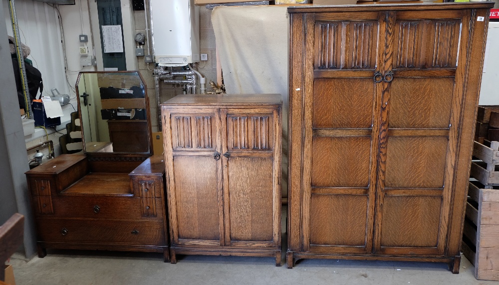 Oak linen fold 2 door wardrobe dressing table and tall boy