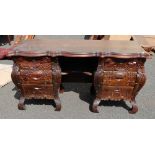 Asian reproduction carved serpentine fronted desk