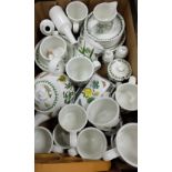 A large collection of Portmeirion dinnerware to include cups, teapot, saucers,