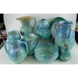 A interesting collection of turquoise ceramic art nouveau items including vases , jugs ,