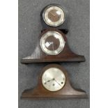 A collection of three oak cased mantle clocks