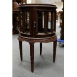 Reproduction mahogany tray top circular display cabinet with glass panels