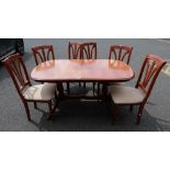 Reproduction draw leaf dining table and six matching chairs