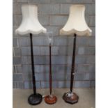 3 wooden standard lamps,