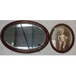 Victorian Oak framed oval mirror together with oak framed photograph of baby girl (2)