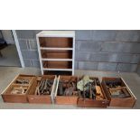 Large collection of vintage hand tools including planes, scribes, rulers, hammers,