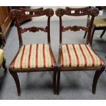 Two decorative dining chairs