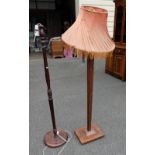 Art Deco carved oak standard lamp together with another (2)