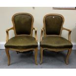 Two upholstered French Carved oak arm chairs (2)