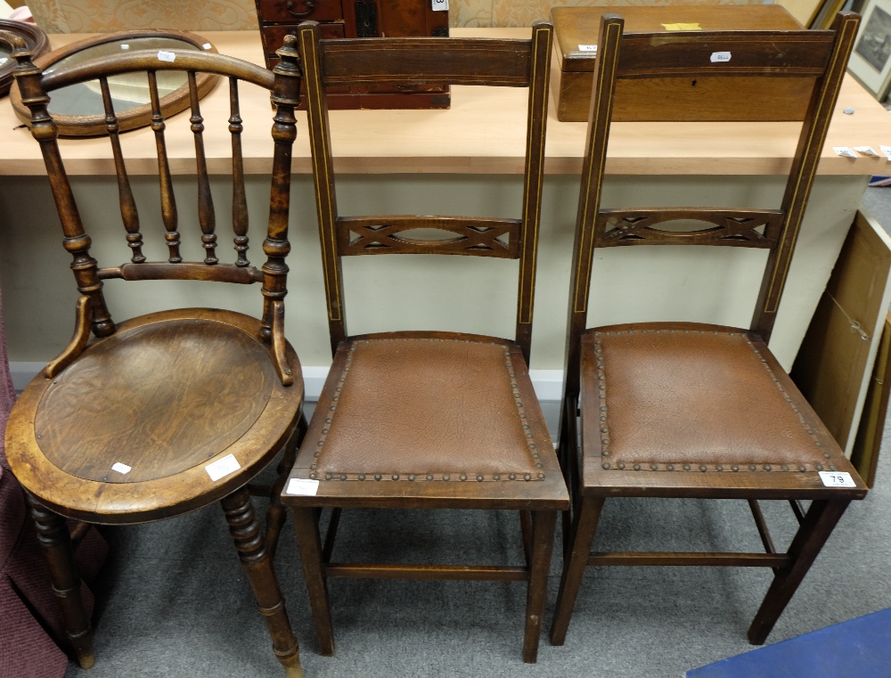 Two oak inlaid ladderback chairs togethe