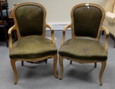 Two upholstered French Carved oak arm ch