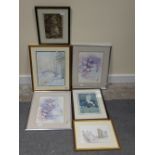 A collection of framed prints to include