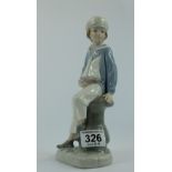 Lladro figure of a Boy with Yacht