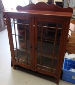 Arts and crafts mahogany glass fronted t
