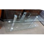 Oversized glass television table