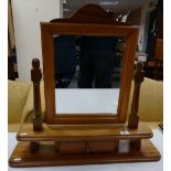 Modern oak dressing table mirror with drawer.