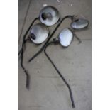 Four swan neck 1930s enameled industrial lights and shades.