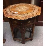 Early 20th Century Indian octagonal rosewood ivory inlaid fold away table (minor loss to ivory).