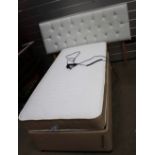 A Pocket flex serenity bed with dual actuator movements and white headboard.