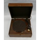 HMV early electric record player in wood cabinet together with a collection of 78's