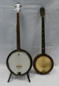 Ozark 5 string banjo with metal stand and an old wood 4 string banjo (3)