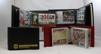 A collection of items including stamp albums first day covers of film and TV programs,
