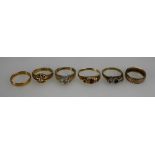 Six Gold rings 3 x 9ct, 2 x 18ct and 1 x 22ct total weight 18.