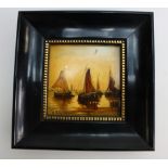 Early 20th Century miniature tile hand painted with ships and signed in black ebony frame,