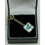 Gold coloured metal mounted Aquamarine with similar chain, total length 38cm total weight 6.