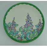 Charlotte Rhead Crown Ducal Charger in the Wisteria design 2954, diameter 32.