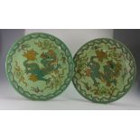 Pair Charlotte Rhead Crown Ducal wall plaques decorated in the Manchu design,