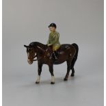 Beswick model of boy on brown pony 1500