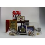 A collection of various items including commemorative coins, silver jewellery,