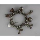 Silver charm bracelet with 8 charms (126.